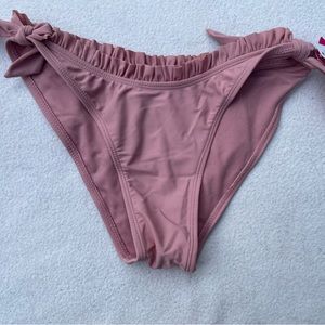 Brand new with tags blush pink swim bottom size small from Xhilaration